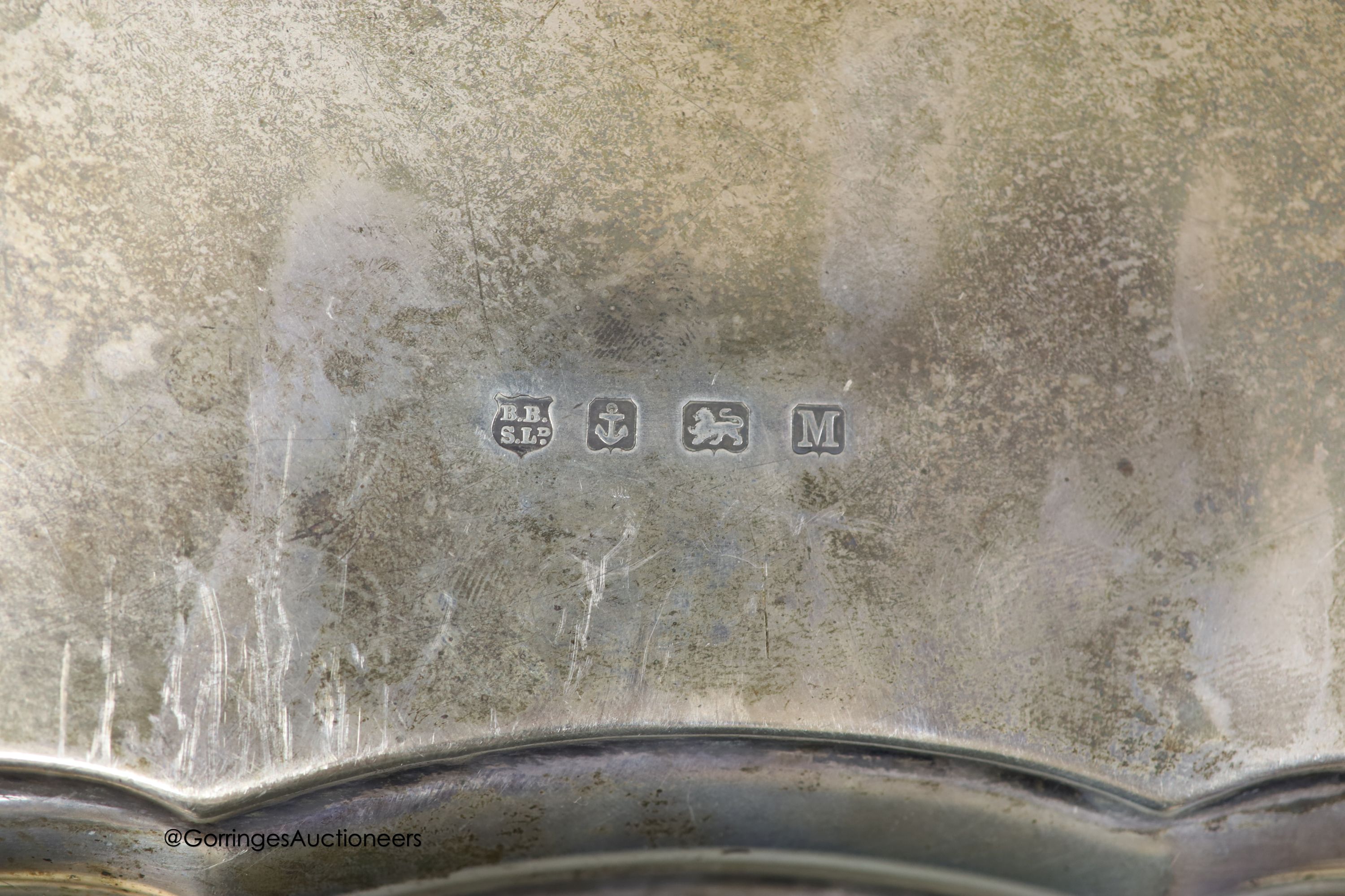 A 1930's shaped square silver salver, Barker Brothers Silver Ltd, Birmingham, 1936, 33.1cm
